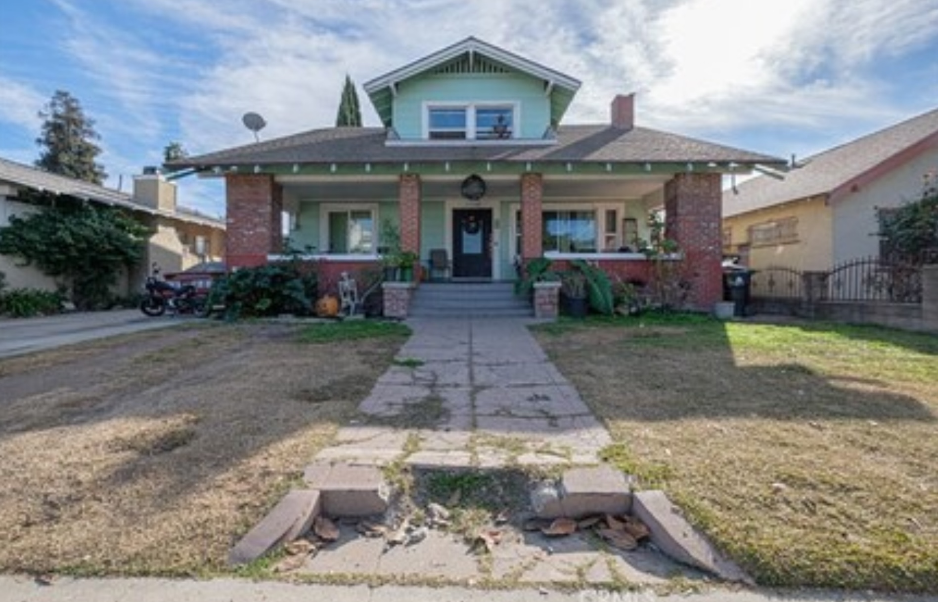 California home exterior needing cosmetic updates